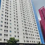 Furnished Green Pramuka 1Br Apartment With Modern Style And City View By Travelio