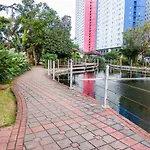 Furnished Green Pramuka 1Br Apartment With Modern Style And City View By Travelio